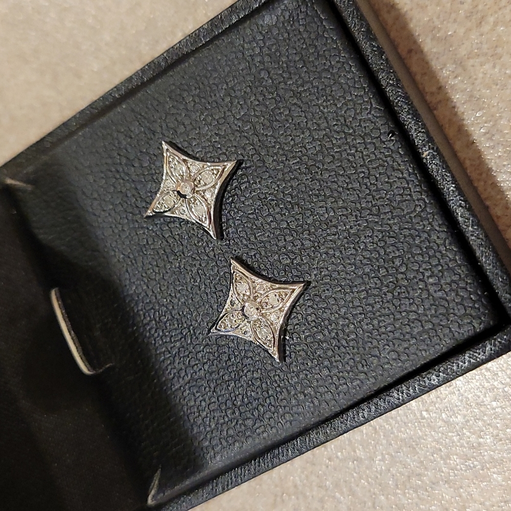 Diamond Star Stud Earrings (1/10 ct. t.w.) in Sterling Silver